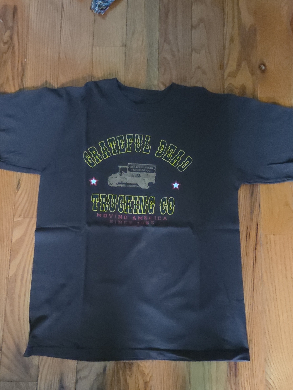 Grateful Dead Black Tee with Yellow & Pink Graphic Trucking Co